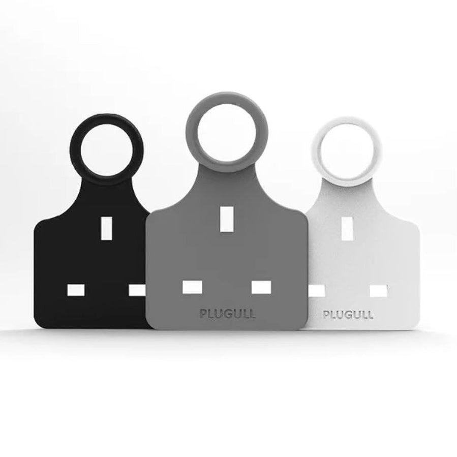 Three Plugull plug pull attachments in black, gray, and white colors, designed to assist with removing electrical plugs.