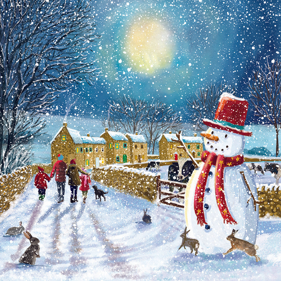Christmas Card showing a painting of a snowy village scene and a large snowman standing and smiling. There are cows and houses in the background, and people and rabbits in the foreground.