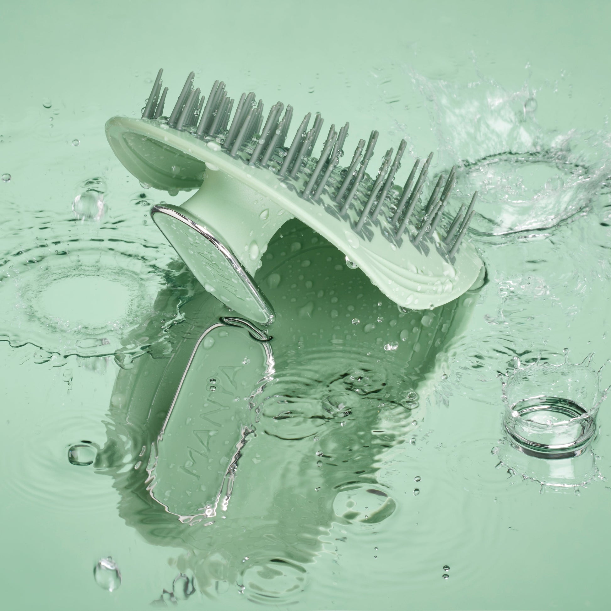 MANTA anti breakage brush in green and white gold.