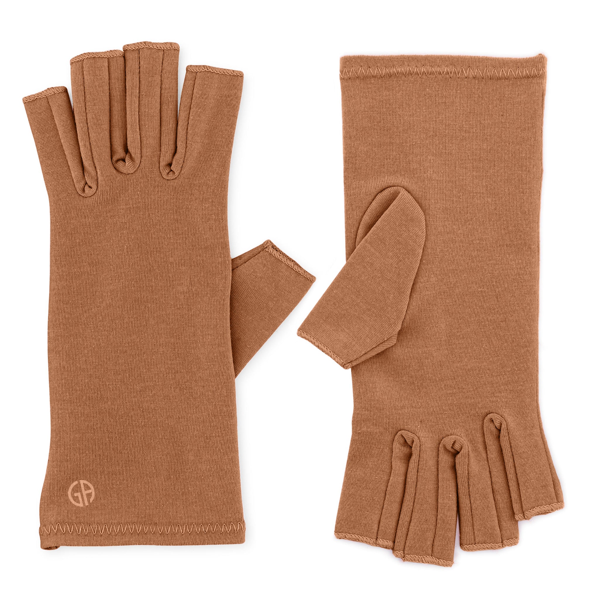 Grace and Able skin tones compression gloves in caramel brown, flat lay on a white background. 