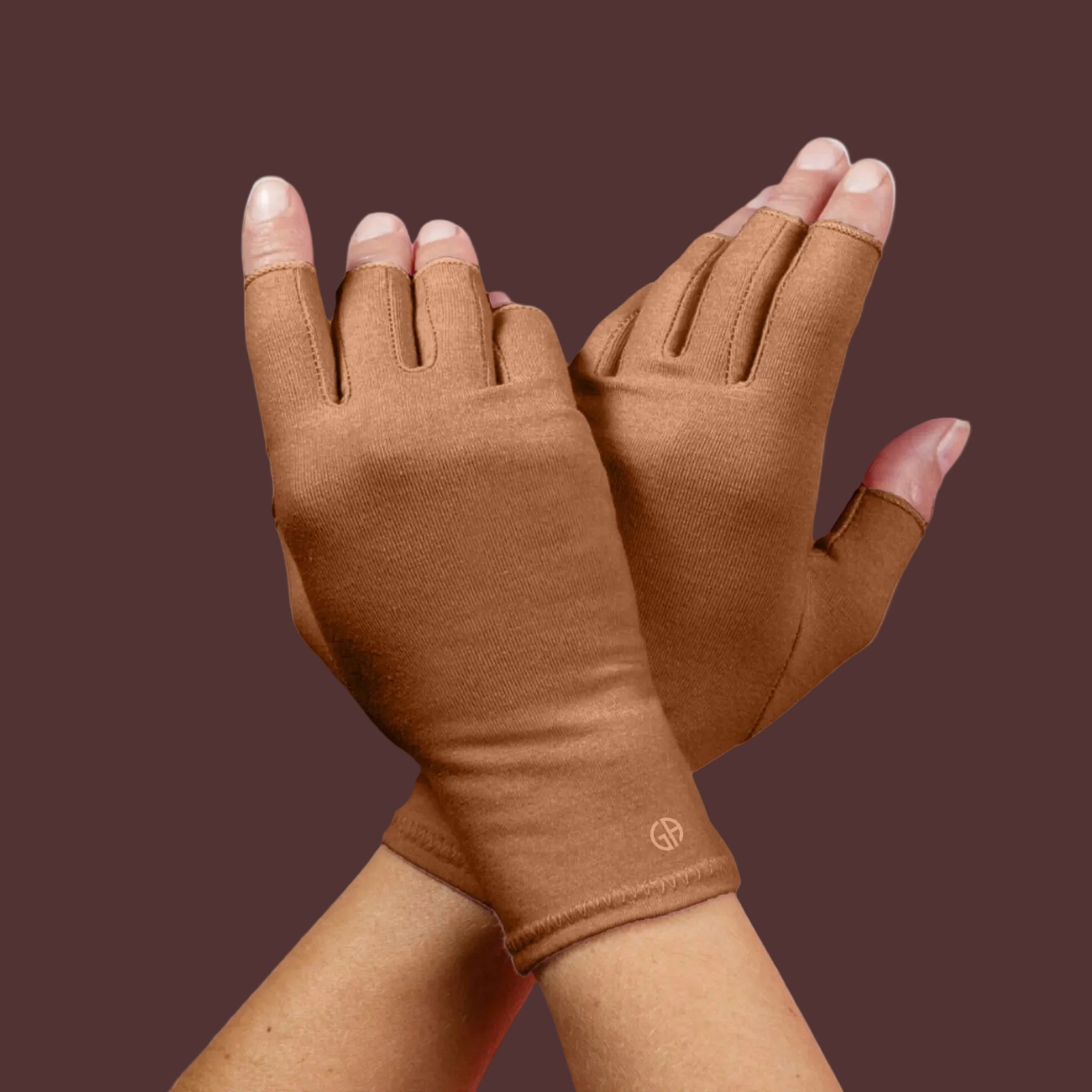 Grace and Able skin tones compression gloves in caramel brown being worn. 
