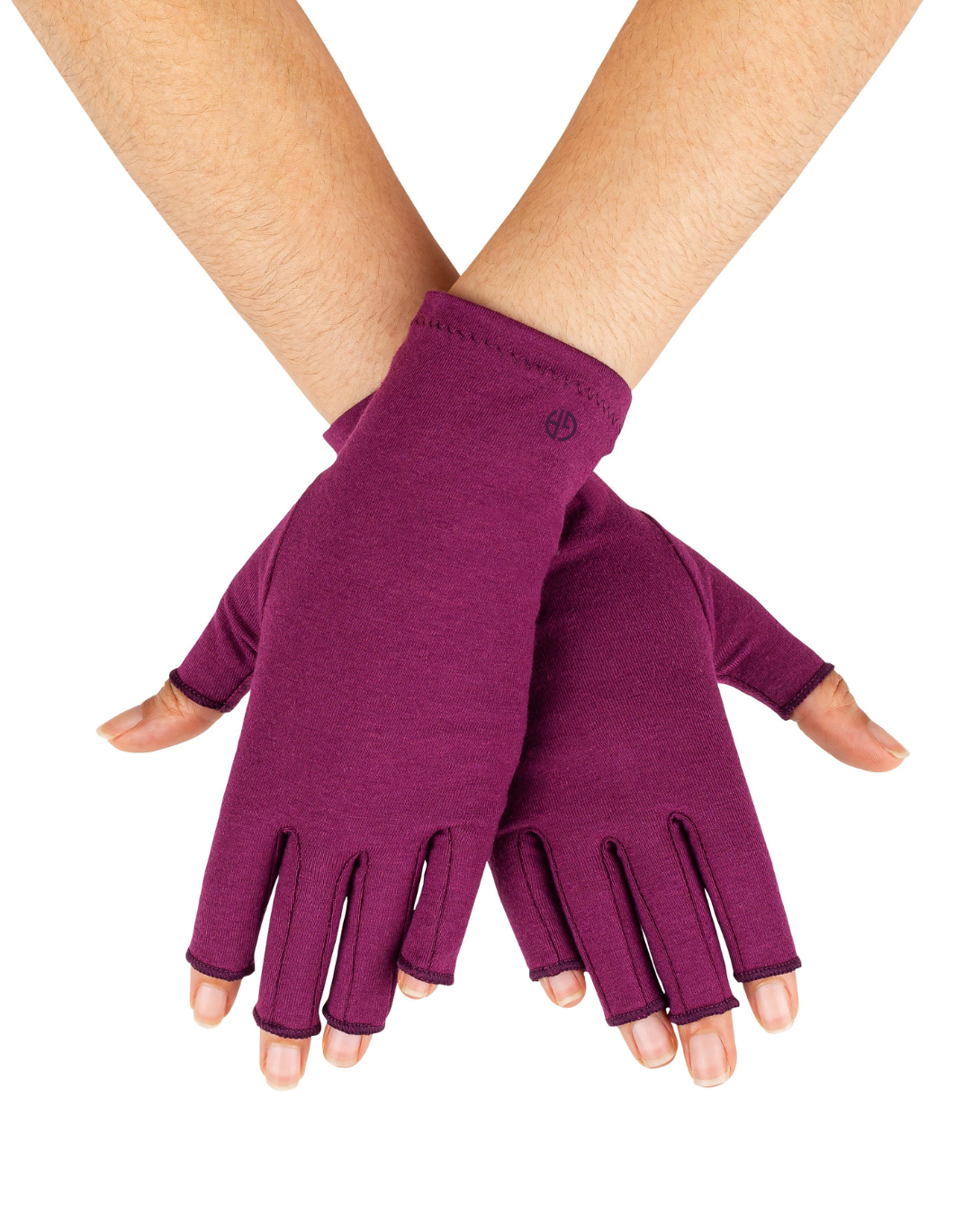 A pair of plum purple compression gloves designed to alleviate joint pain, with the hands facing forward showing the palm side of the gloves.