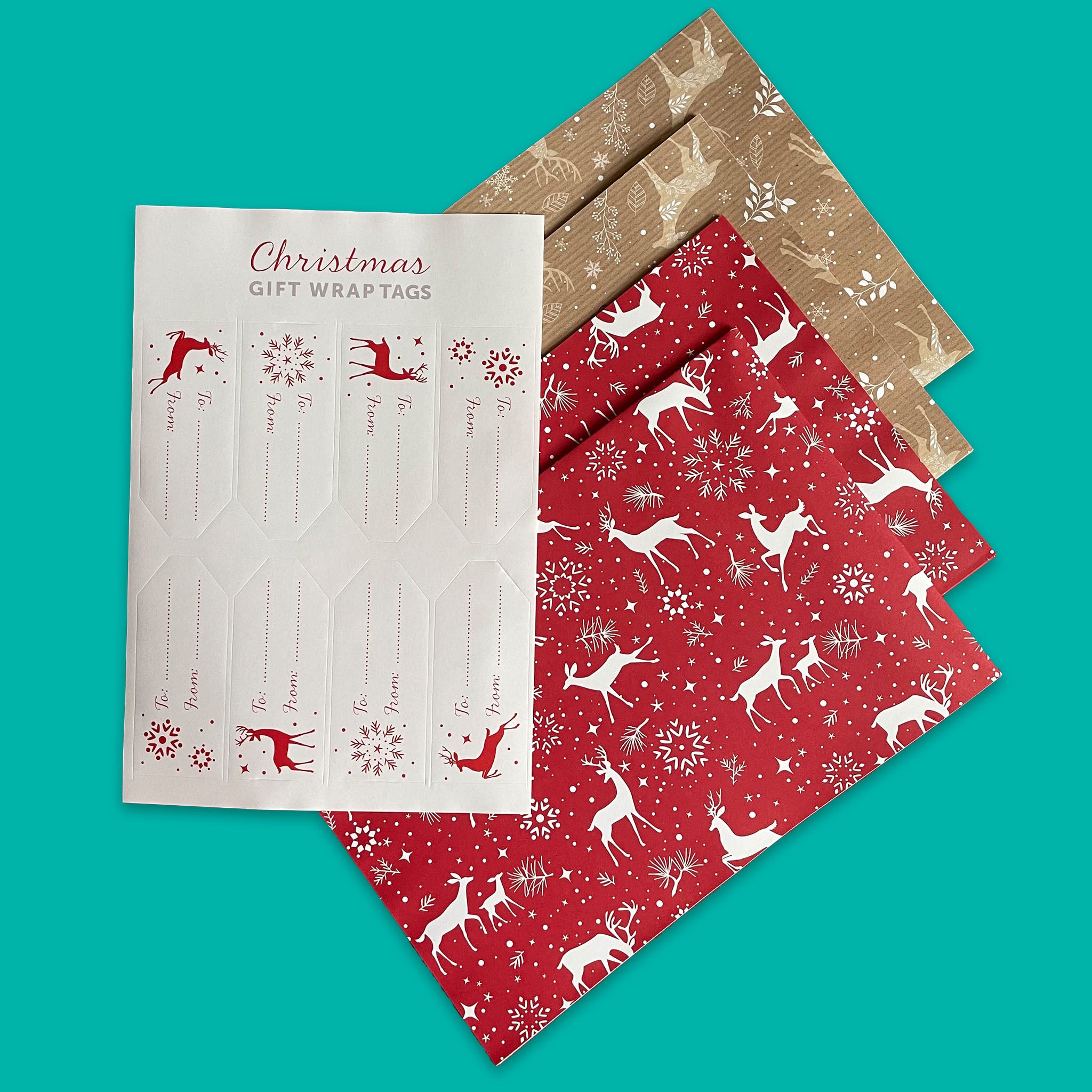 Eco-friendly, recyclable stag-design gift wrap in red and brown tones, including a set of eight tags.