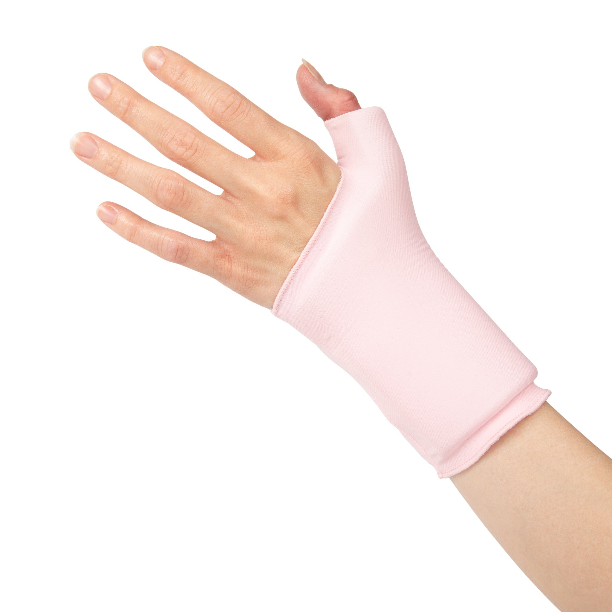 Hand wearing a pink Grace and Able Cooling Compression Sleeve For Thumb & Wrist Pain on a white background