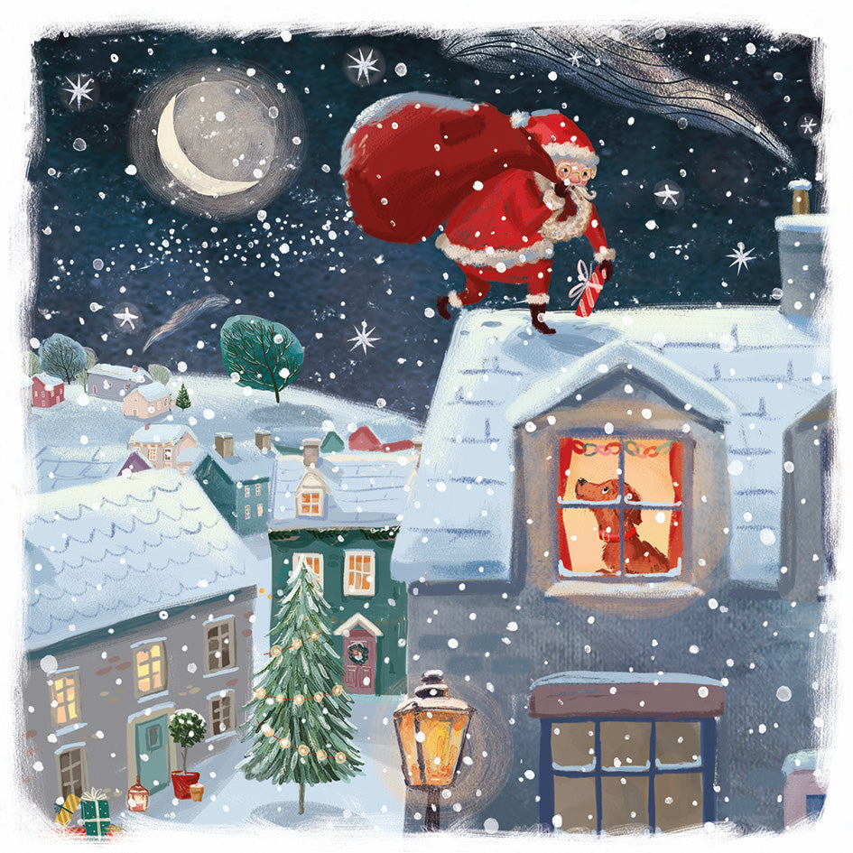 Front cover of the Arthritis UK Christmas Card 'I Saw Santa' featuring Santa climbing across snow-covered rooftops, and a dog in a window watching. 