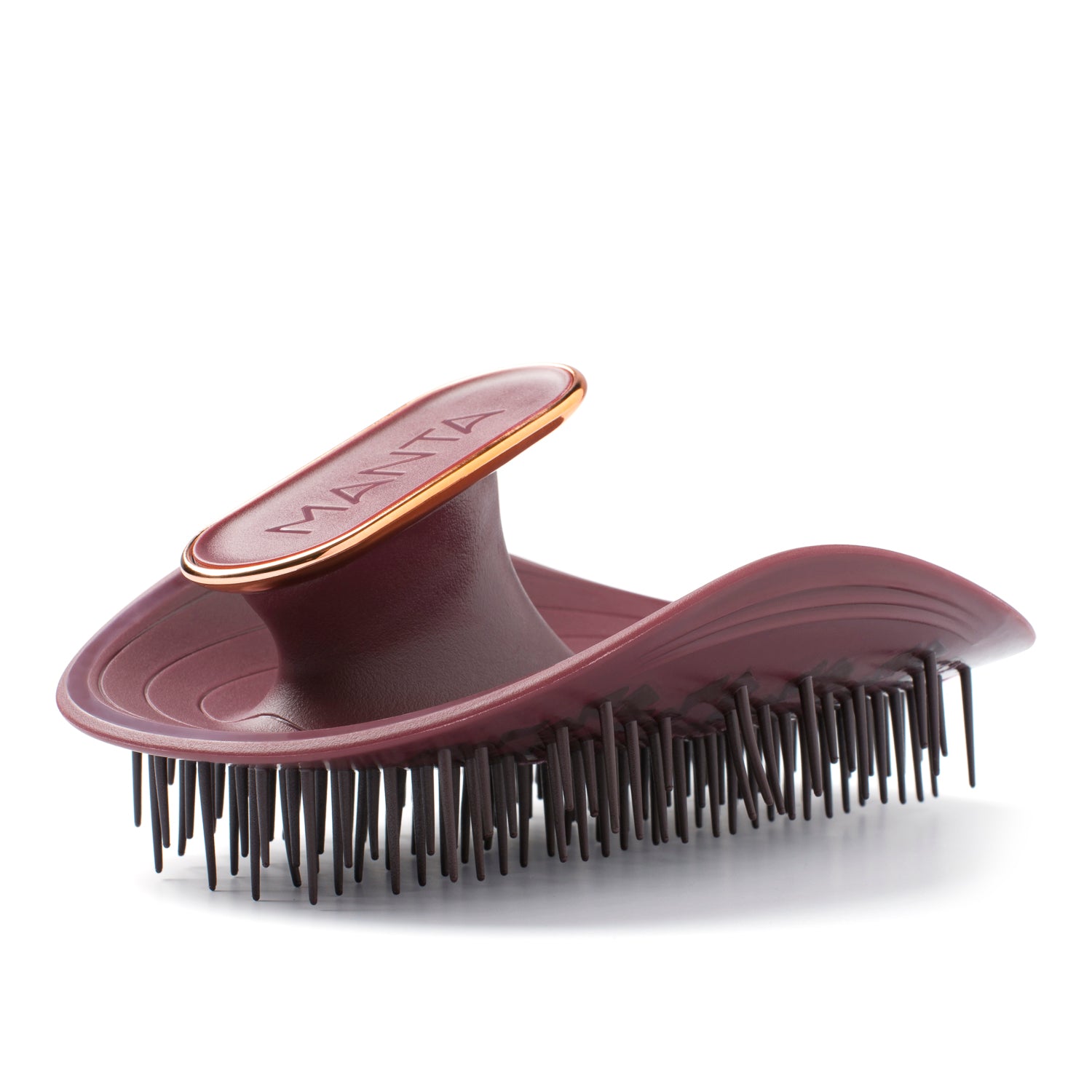 MANTA hair brush in burgundy and rose gold, on a white background. 