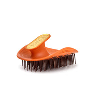 MANTA curls hair brush for textured hair in amber orange. 