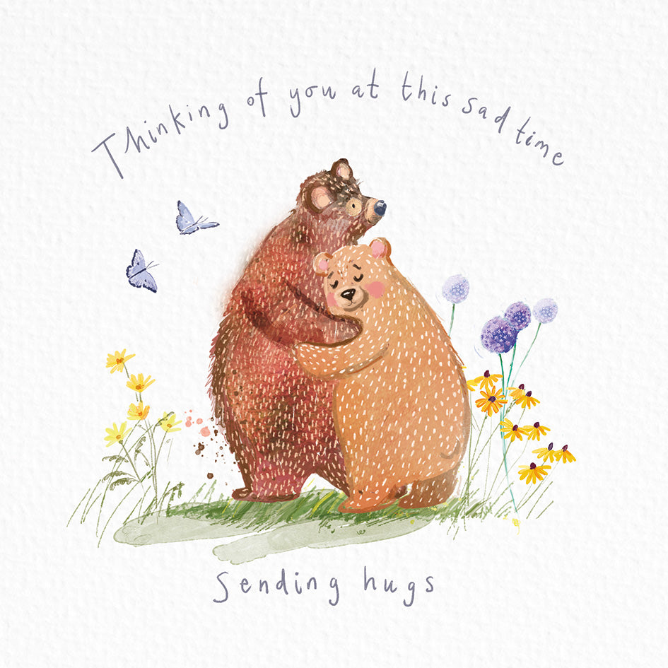 Watercolor-style illustration of a two bears hugging, with the text 'Thinking of you at this sad time' above and 'Sending hugs' below, on a white background with small flowers and butterflies.