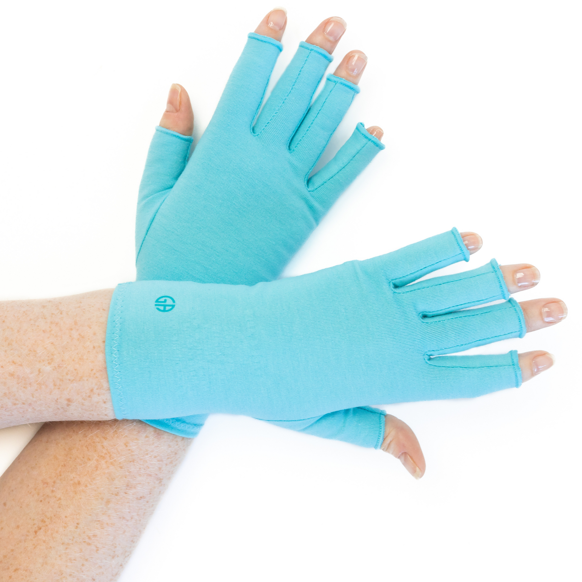 Grace and Able compression gloves in aqua blue, shown worn on hands