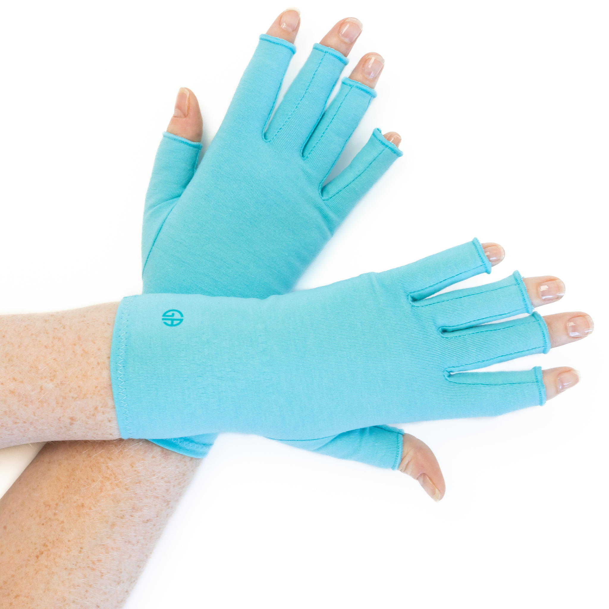 Grace and Able compression gloves in aqua blue, shown worn on hands