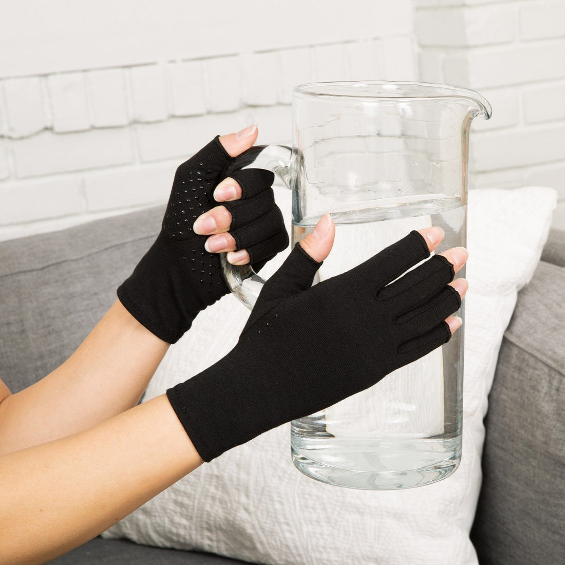 Extra grip compression gloves with silicone dots for arthritis and carpal tunnel in classic black. 