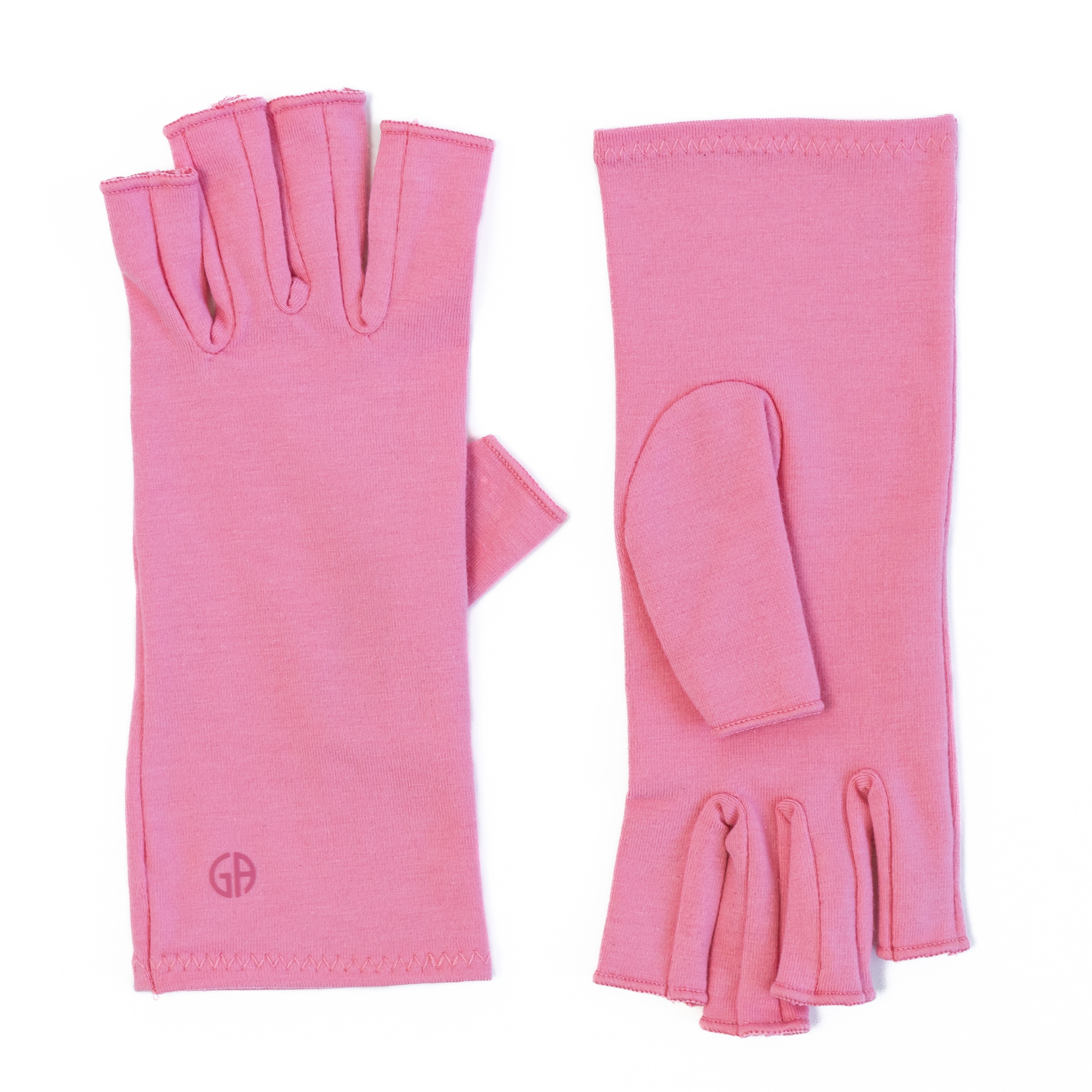 Grace and Able gloves for swollen joints in coral pink, shown as a flat lay.