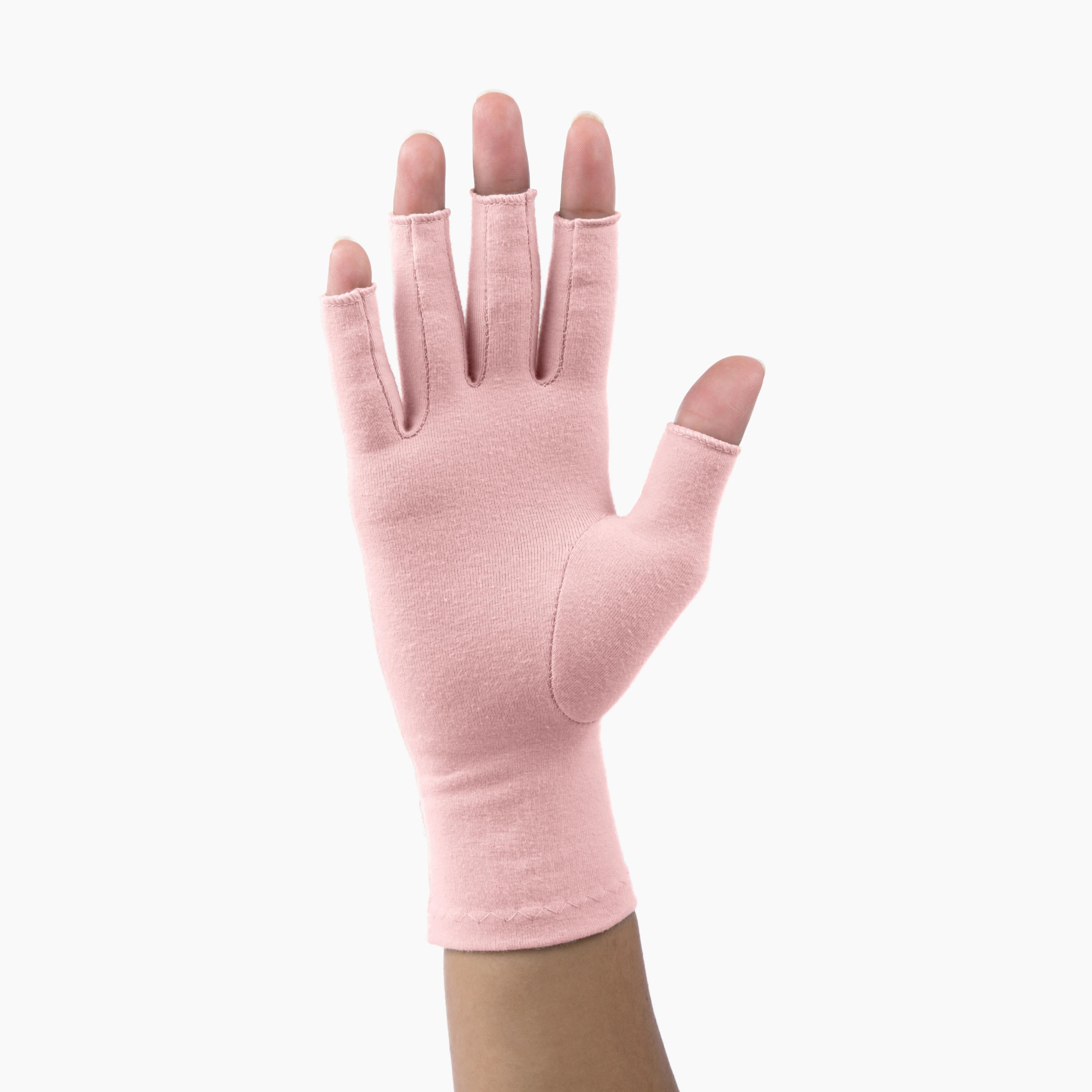 palm of hand wearing Grace and Able tickled pink compression gloves